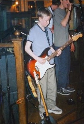 Martin playing the guitar