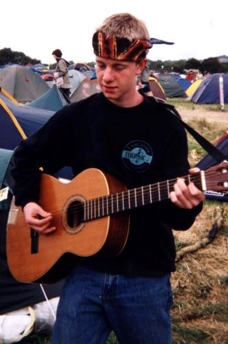 Martin playing the guitar