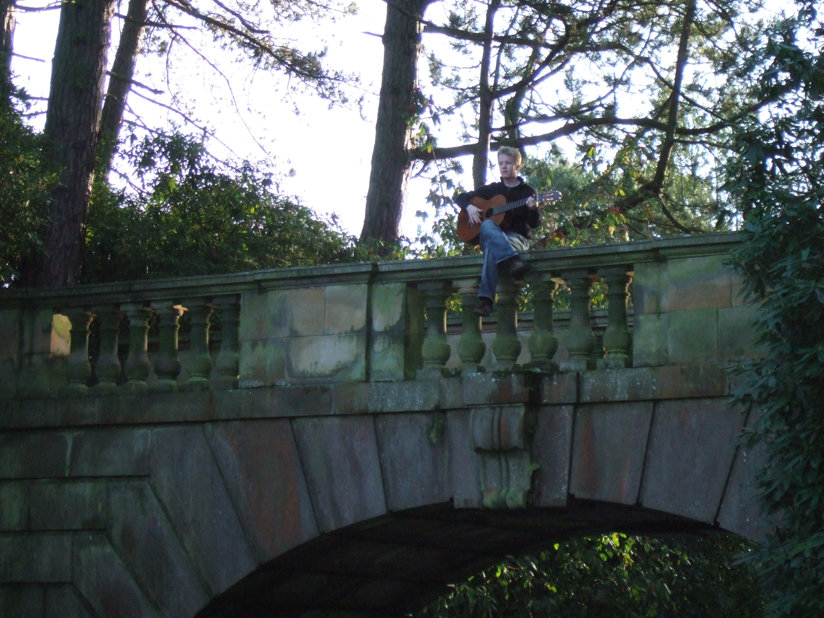 Martin sitting on the bridge at Williamson Park 